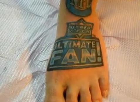 Ultimate NFL Fan contest. As the victor, Ellis, who sports 33 tattooed